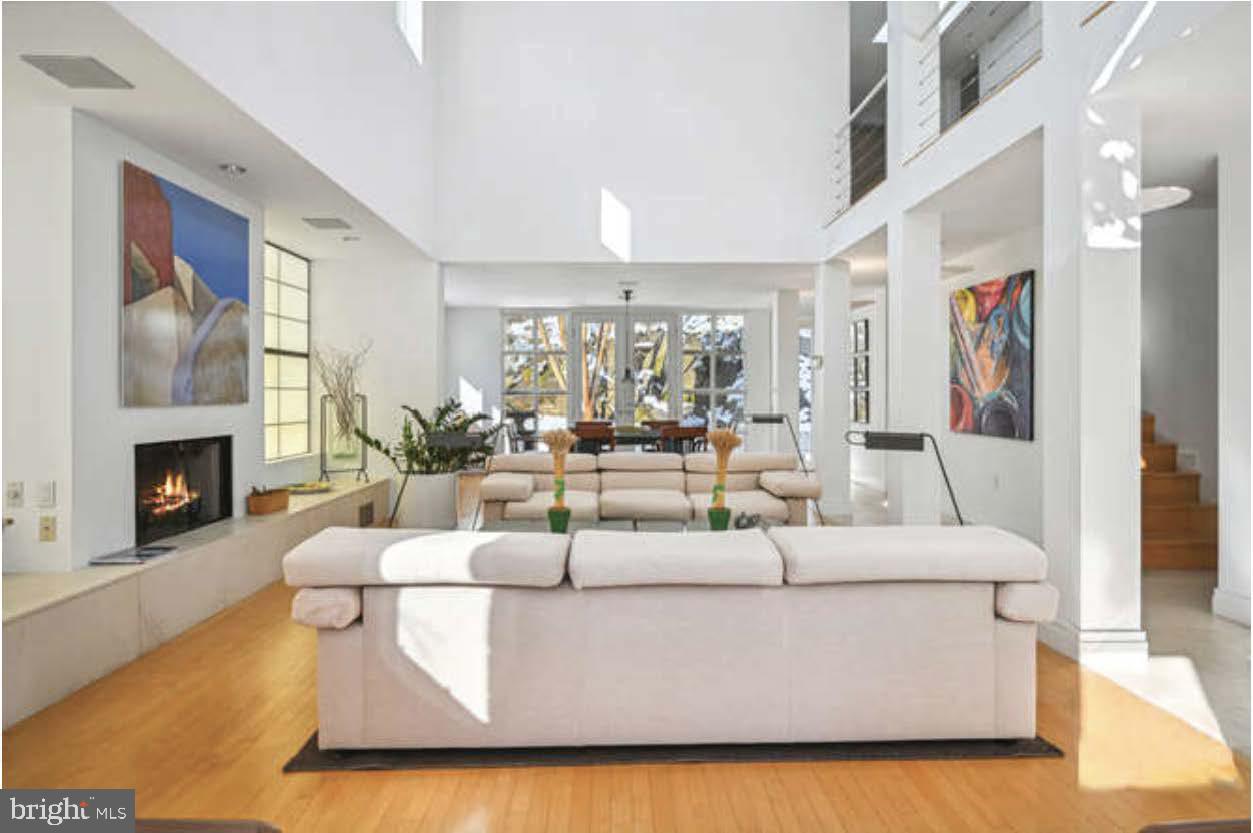 4527 Q Place Northwest Washington, DC 20007 - Photo 37 of 54 a living room with furniture and a fireplace