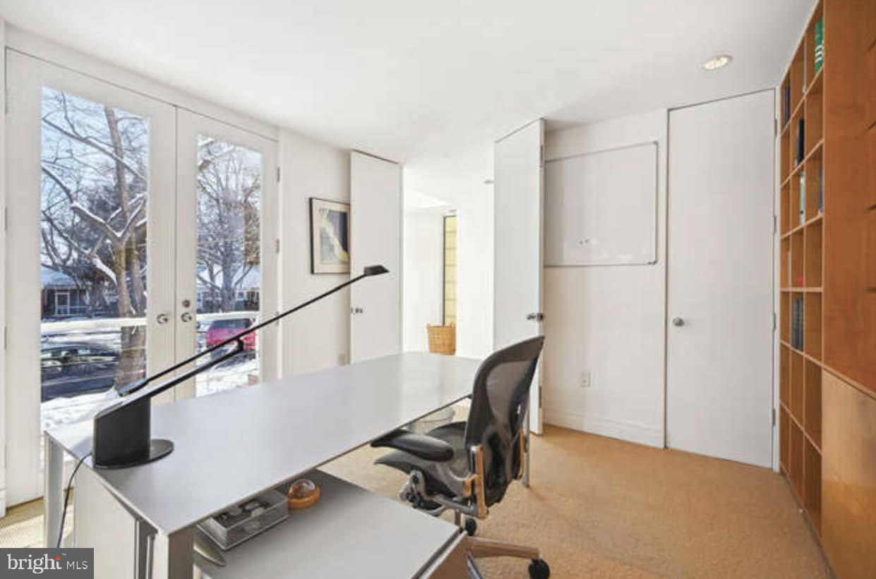 4527 Q Place Northwest Washington, DC 20007 - Photo 38 of 54 a view of hallway with furniture and a window