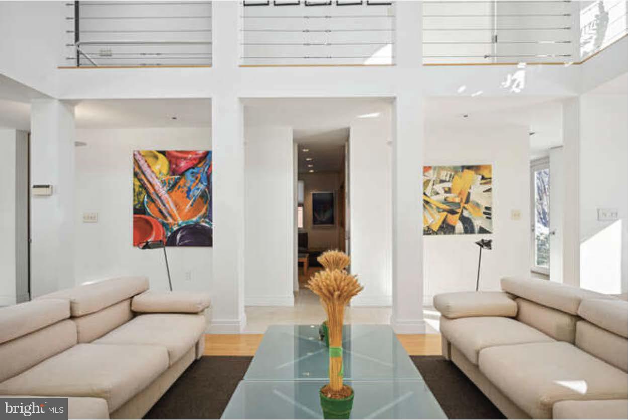 4527 Q Place Northwest Washington, DC 20007 - Photo 41 of 54 a living room with furniture and a painting