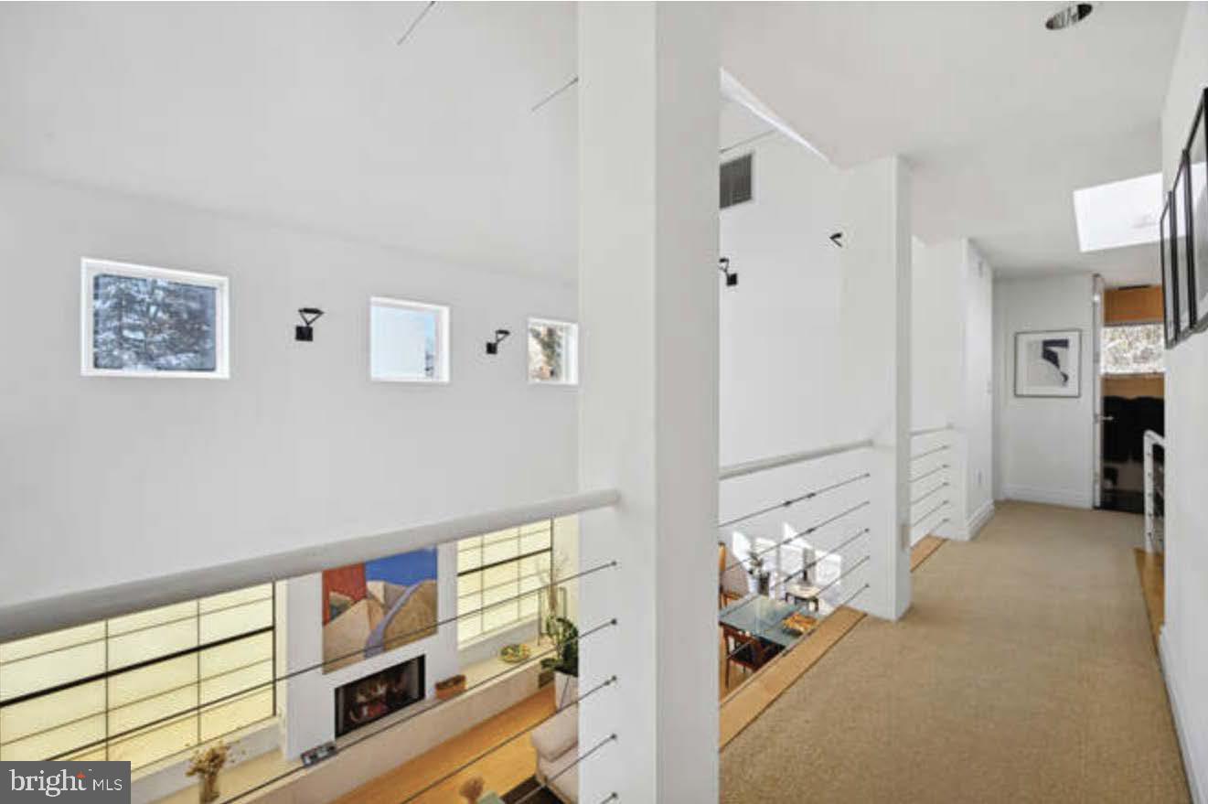 4527 Q Place Northwest Washington, DC 20007 - Photo 45 of 54 a view of a hallway with workspace