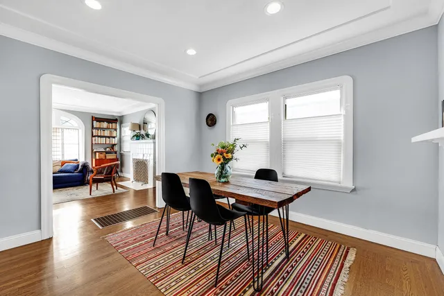 a view of a livingroom with furniture and wooden floor