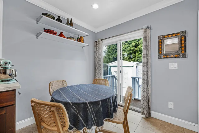 a kitchen with stainless steel appliances granite countertop a refrigerator stove and oven