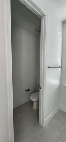 a bathroom with a double vanity sink and mirror