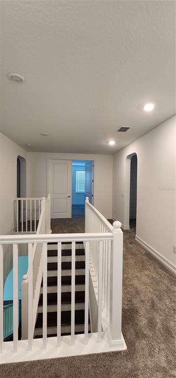 29868 Picana Lane Wesley Chapel, FL 33543 - Photo 25 of 75 a view of an empty room with a window