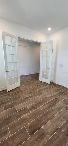 an aerial view of a house with a garden