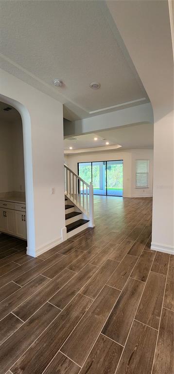 29868 Picana Lane Wesley Chapel, FL 33543 - Photo 48 of 75 a view of an empty room with a window