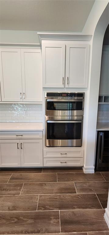 29868 Picana Lane Wesley Chapel, FL 33543 - Photo 5 of 75 a stove top oven sitting inside of a kitchen