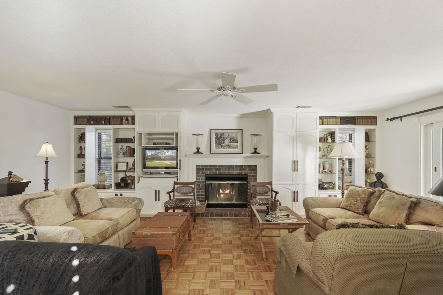 1636 Timberlake Circle Lodi, CA 95242 - Photo 15 of 44 a living room with furniture a fireplace and a window