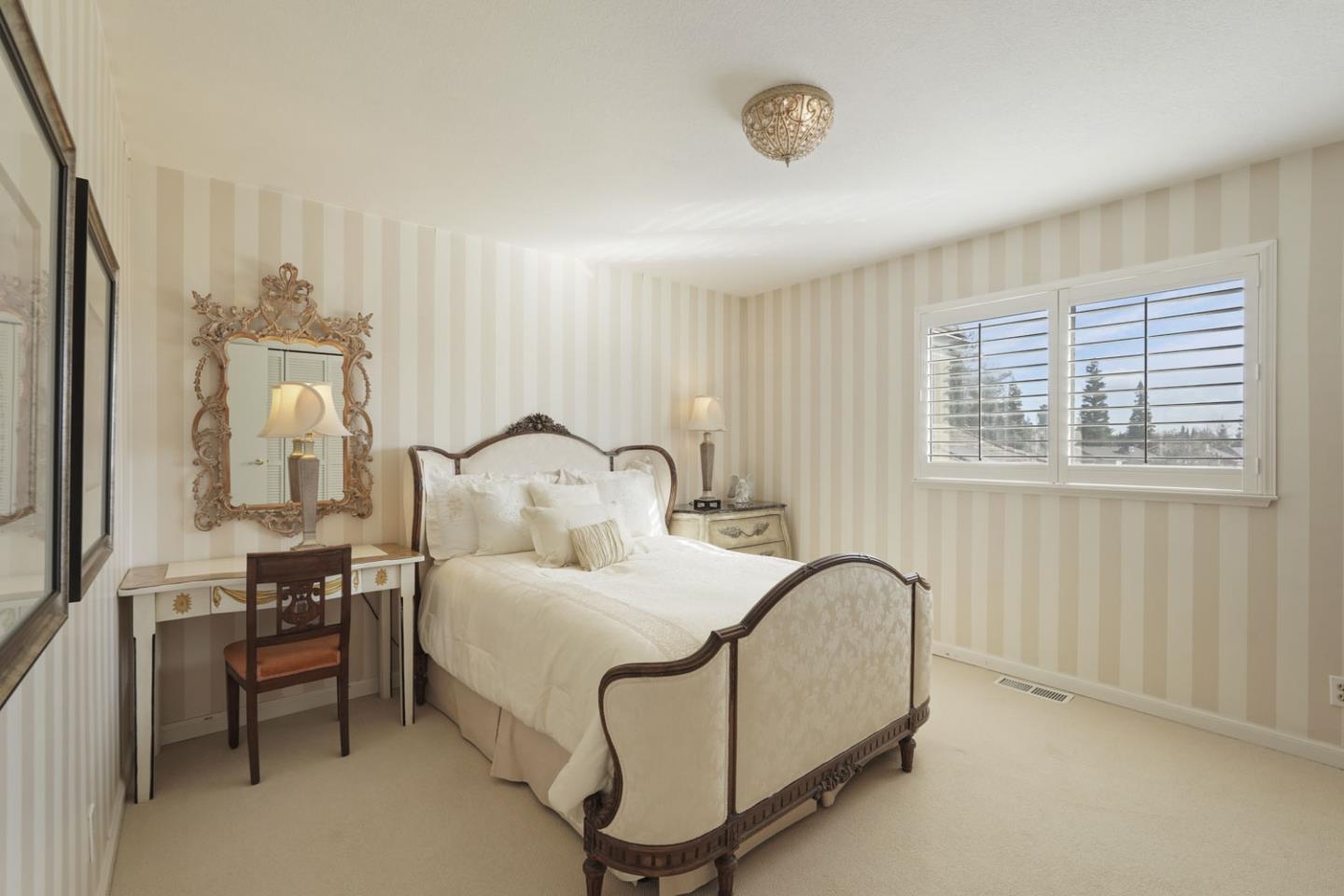 1636 Timberlake Circle Lodi, CA 95242 - Photo 19 of 44 a bedroom with bed and a window