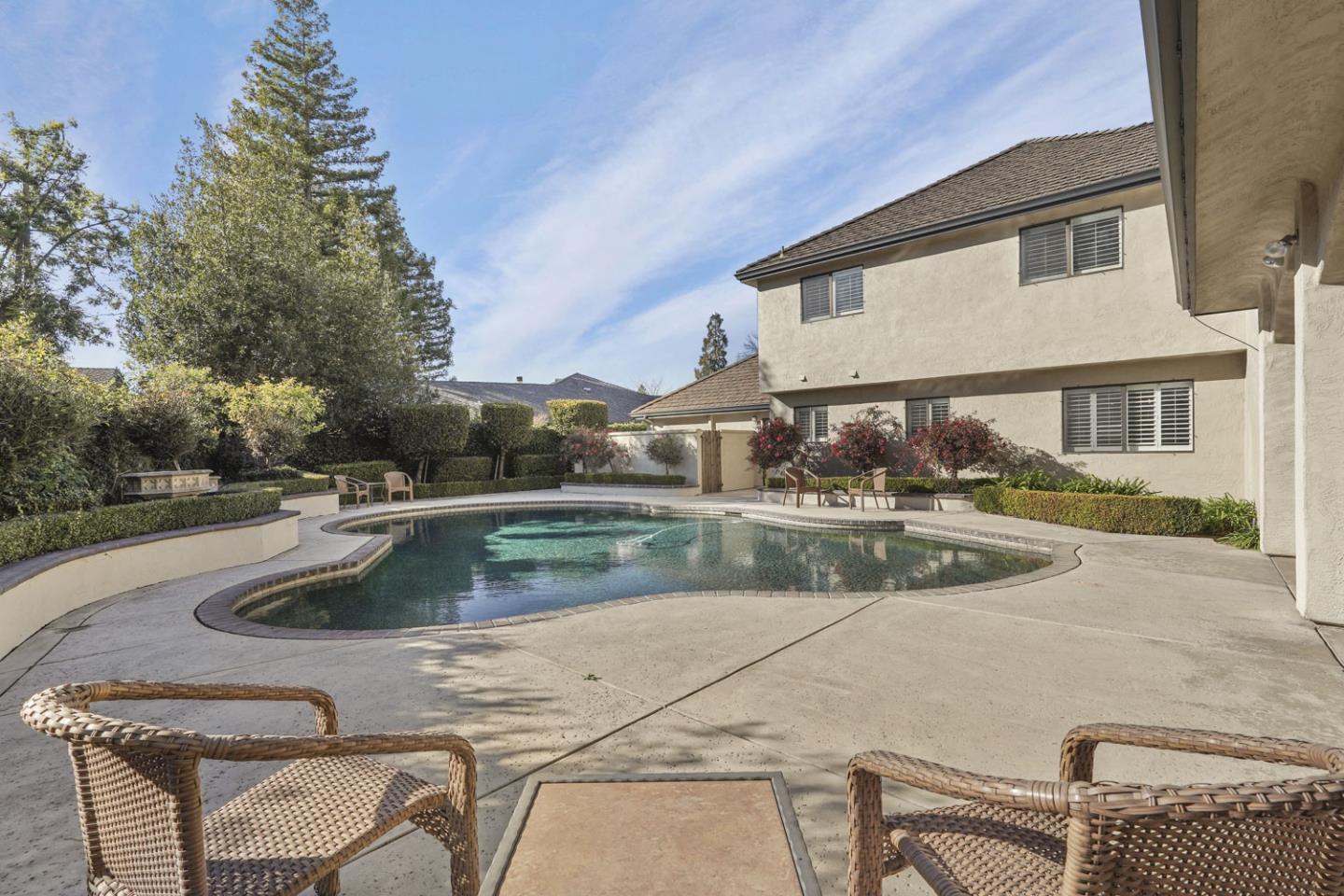 1636 Timberlake Circle Lodi, CA 95242 - Photo 32 of 44 a view of a house with pool and trees