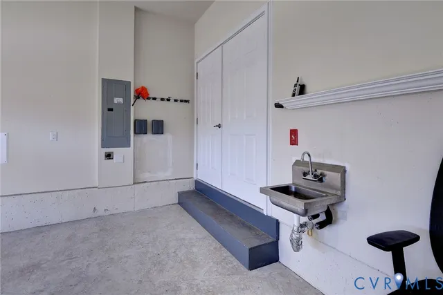 a room with gym equipment and a window