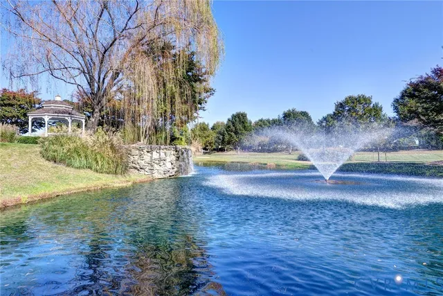 a view of water fountain in front of building