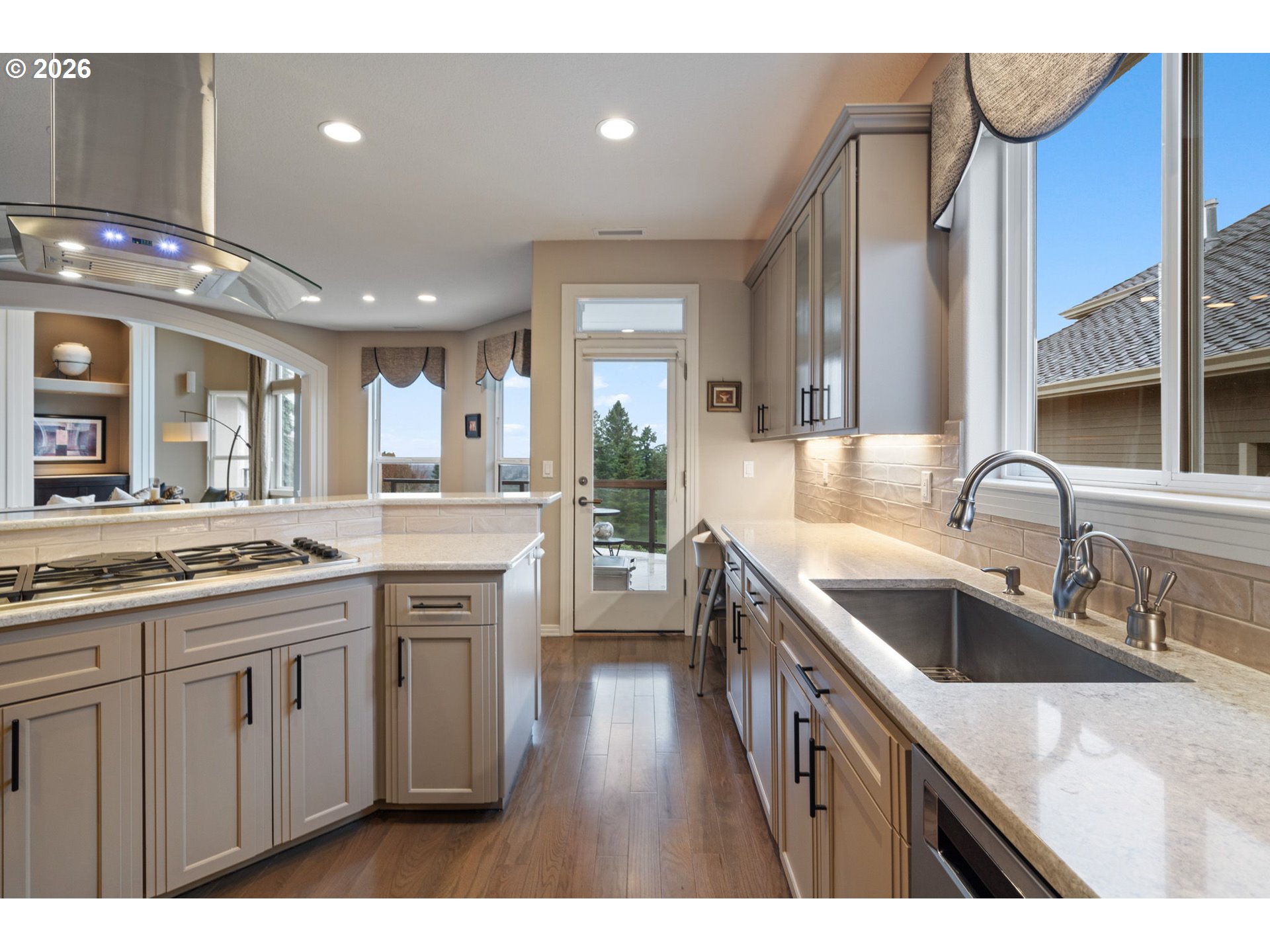 2305 Northwest Douglas Street Camas, WA 98607 - Photo 11 of 46 a kitchen with a sink stove and cabinets