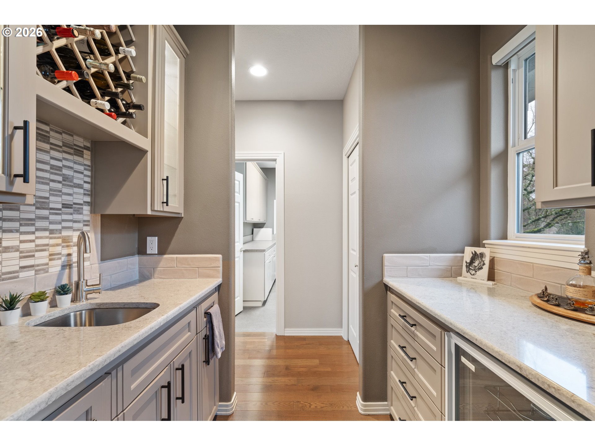 2305 Northwest Douglas Street Camas, WA 98607 - Photo 17 of 46 a kitchen with a sink a refrigerator and cabinets
