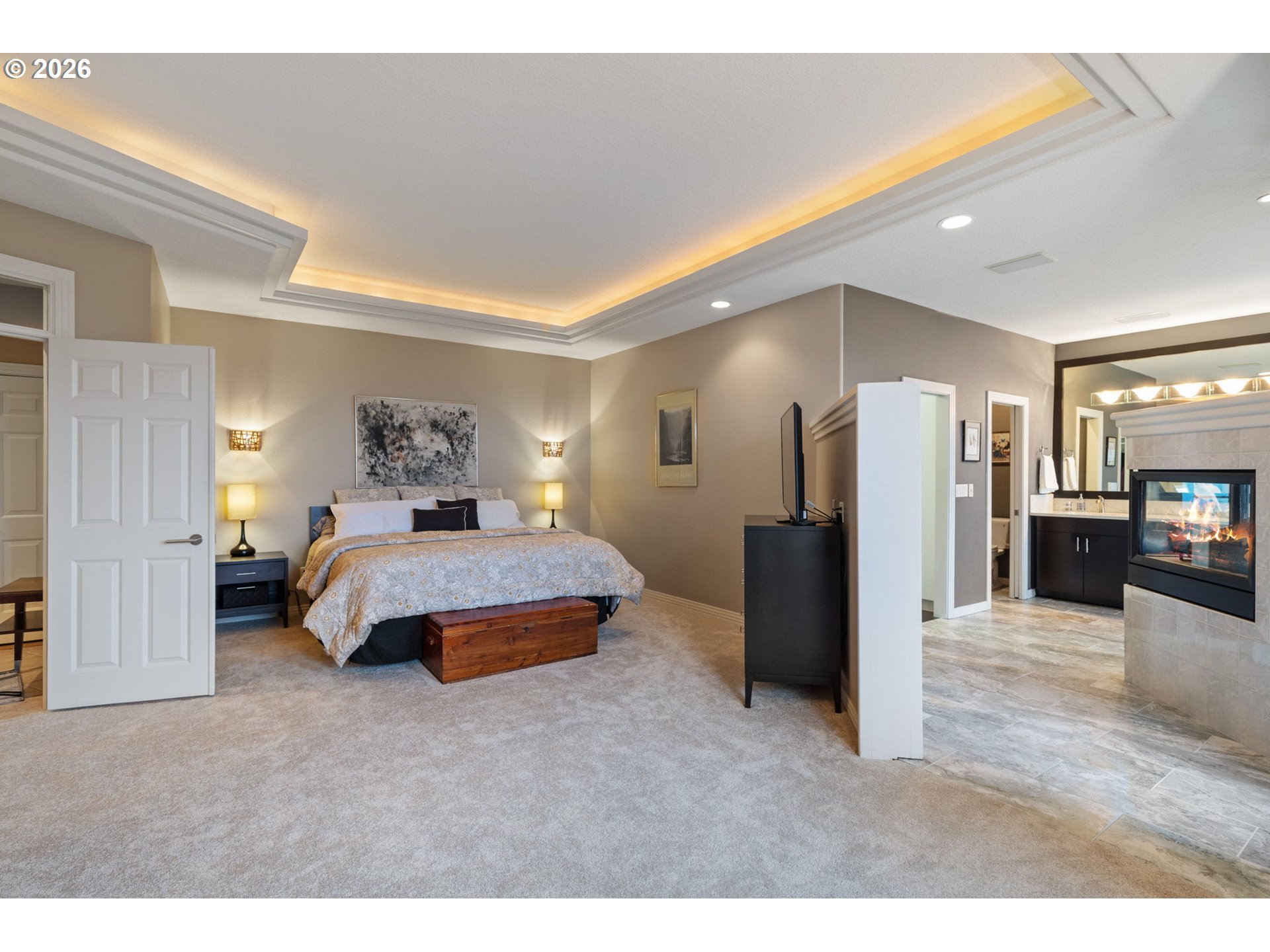 2305 Northwest Douglas Street Camas, WA 98607 - Photo 18 of 46 a spacious bedroom with a bed and a view of kitchen