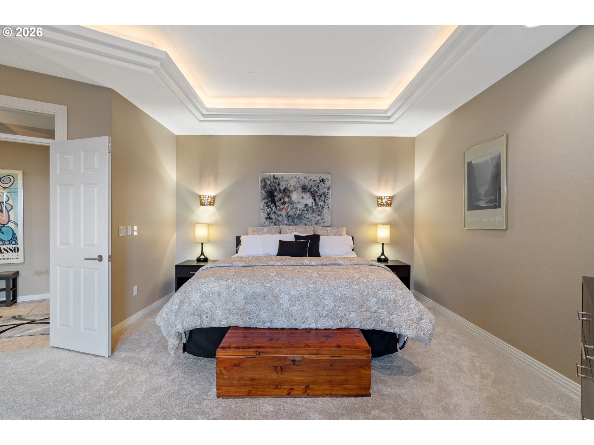 2305 Northwest Douglas Street Camas, WA 98607 - Photo 19 of 46 a bedroom with a bed and painting on the wall