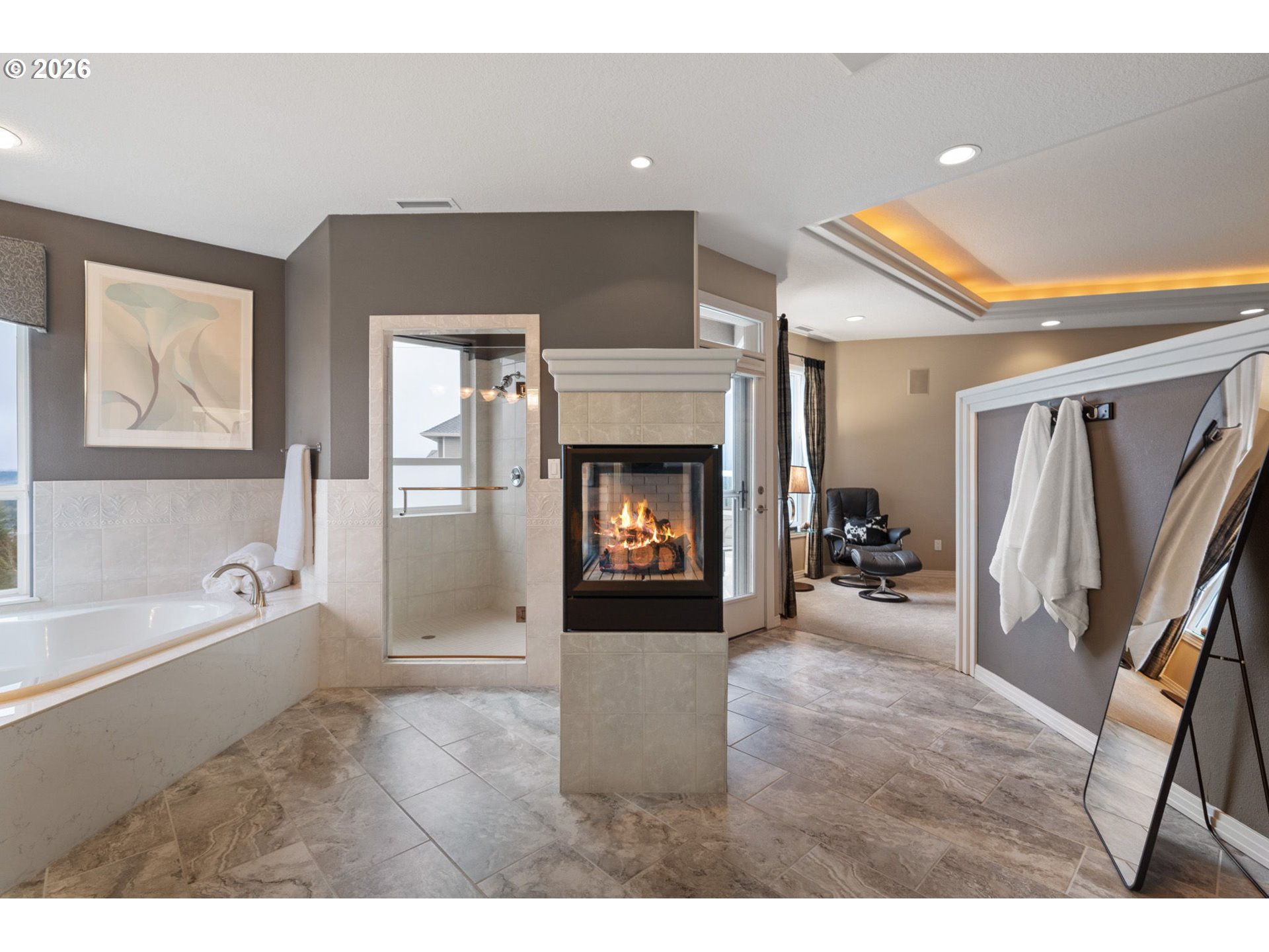 2305 Northwest Douglas Street Camas, WA 98607 - Photo 20 of 46 a living room with furniture and a fireplace