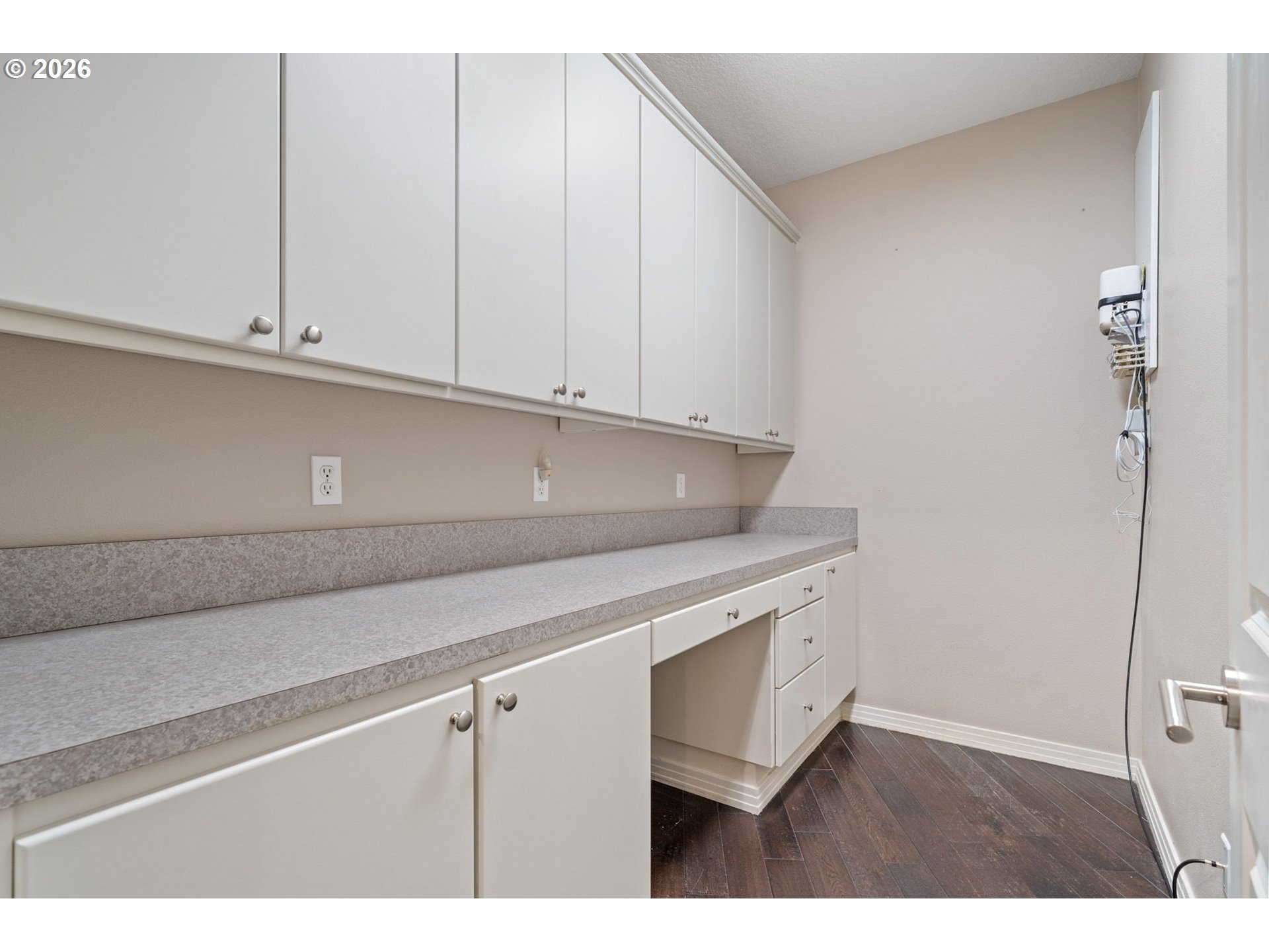 2305 Northwest Douglas Street Camas, WA 98607 - Photo 35 of 46 a kitchen with white cabinets and a sink