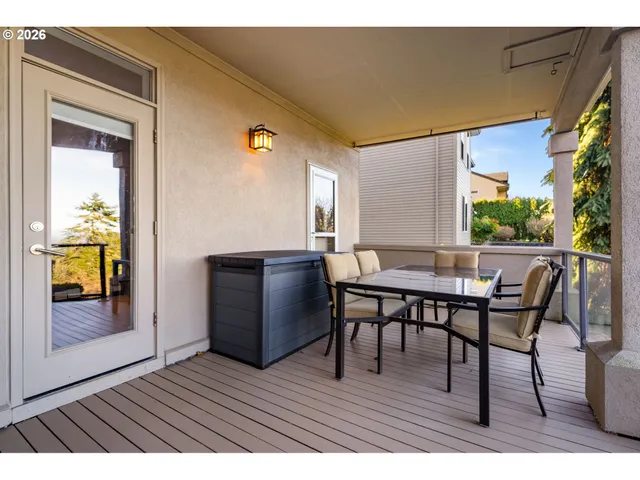 a view of a tables and chairs in patio of the house