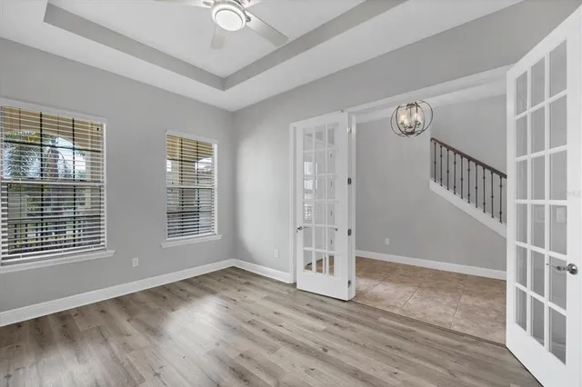 a kitchen with a sink refrigerator and microwave