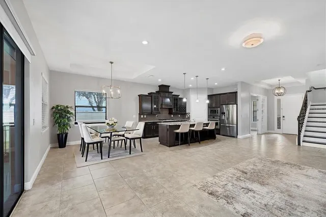 a living room with furniture and a table