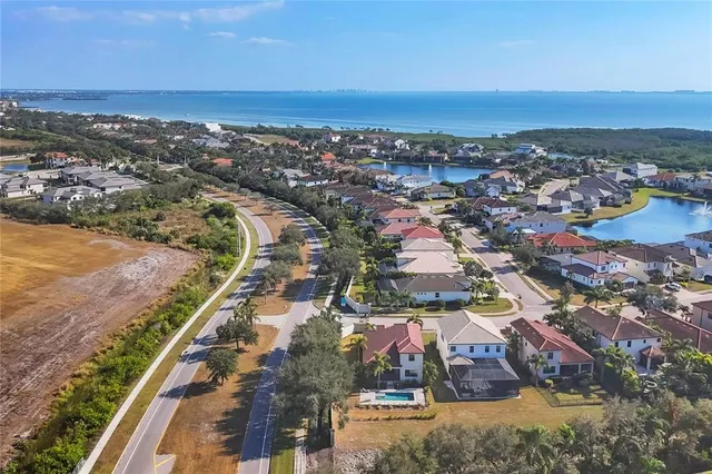 a view of balcony with wooden floor and fence
