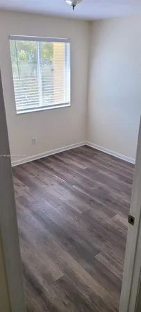 a bathroom with a toilet a sink and bathtub