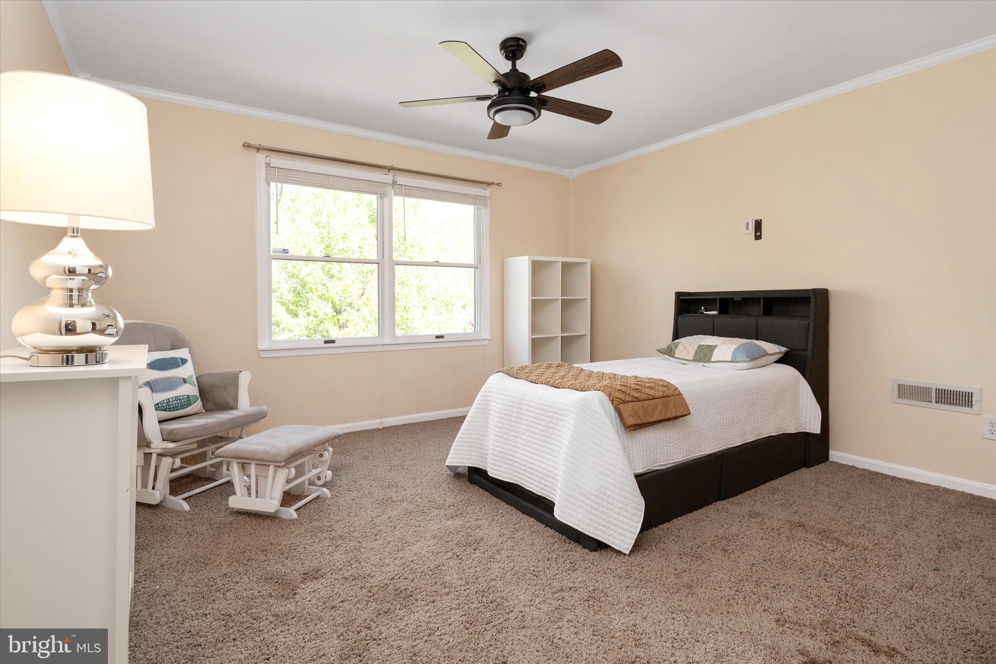 2008 Bridgepointe Drive Chester, MD 21619 - Photo 17 of 41 a spacious bedroom with a bed and a window