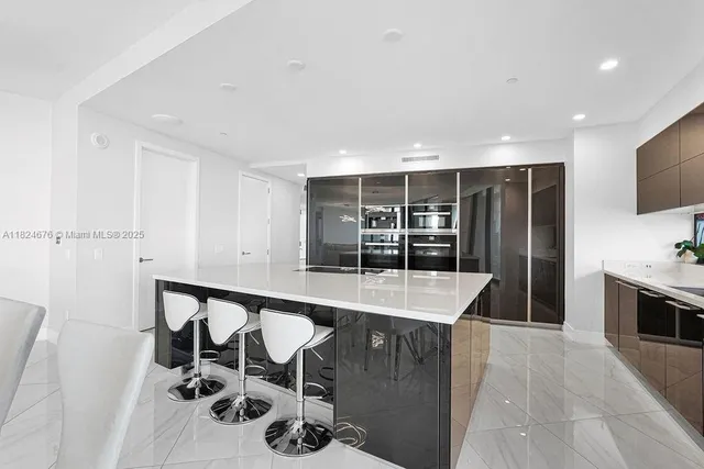 a room with table and chairs