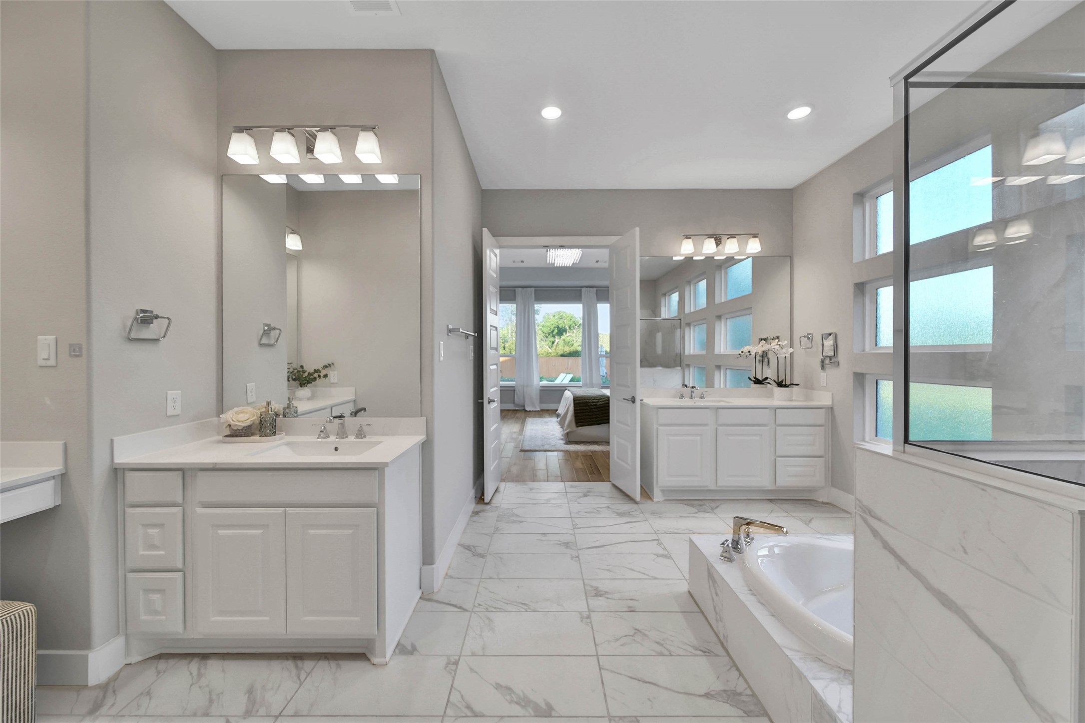29402 Cir S Rnch Trail Fulshear, TX 77406 - Photo 26 of 50 This spa-like primary bath offers a serene, zen-like feel that invites relaxation. It’s a peaceful retreat designed for comfort and rejuvenation.