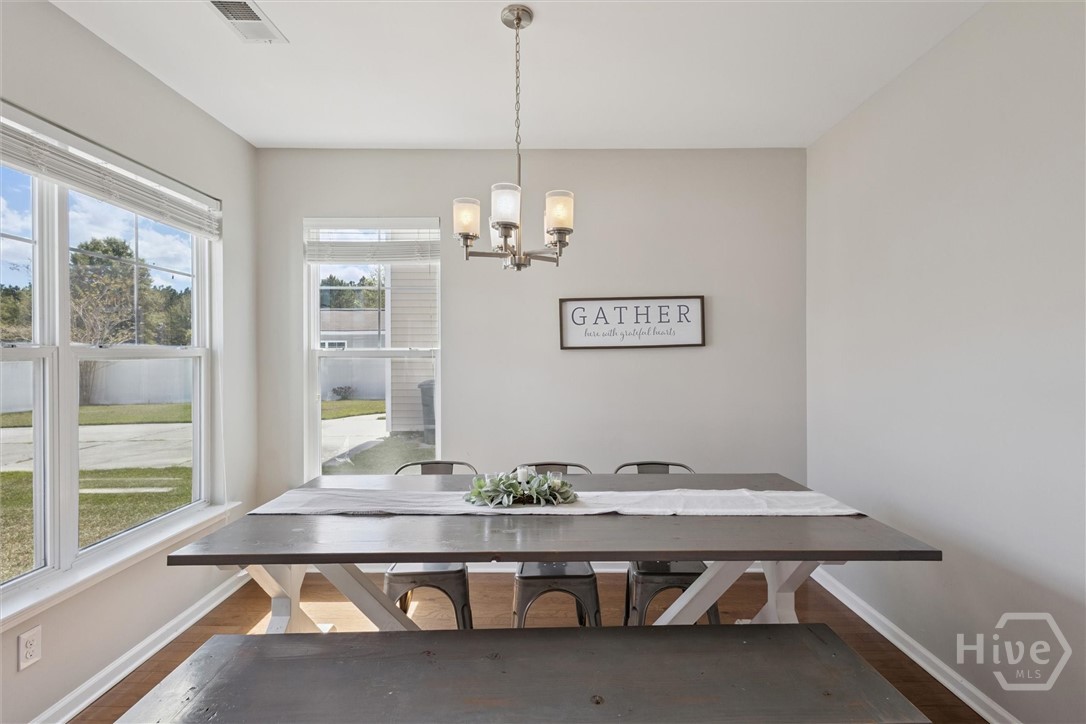 75 Timber Crest Court Savannah, GA 31407 - Photo 15 of 43 Past the kitchen is a room currently being used as a dining room. At 8'4"x11'9" it could also serve as an office, a media room, playroom, or man cave.