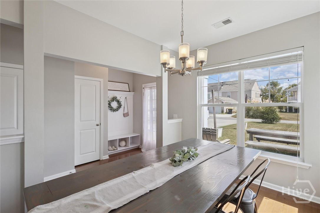 75 Timber Crest Court Savannah, GA 31407 - Photo 16 of 43 The hallway leading outside has a door to a powder room and a drop zone to catch shoes, bookbags, sports equipment, even coats and hats. The laundry room is located opposite the kitchen under the stairway landing.