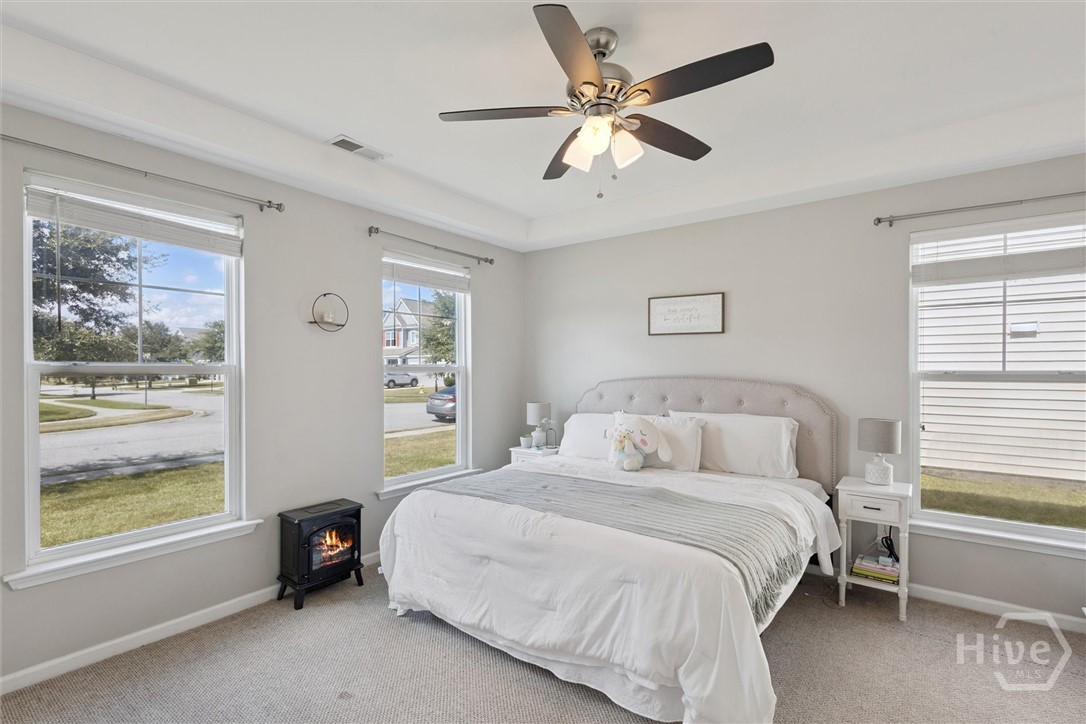 75 Timber Crest Court Savannah, GA 31407 - Photo 19 of 43 The primary en-suite is located downstairs measuring 13'9"x13'10".