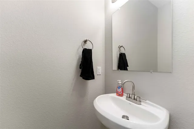 a view of living room with furniture and a flat screen tv