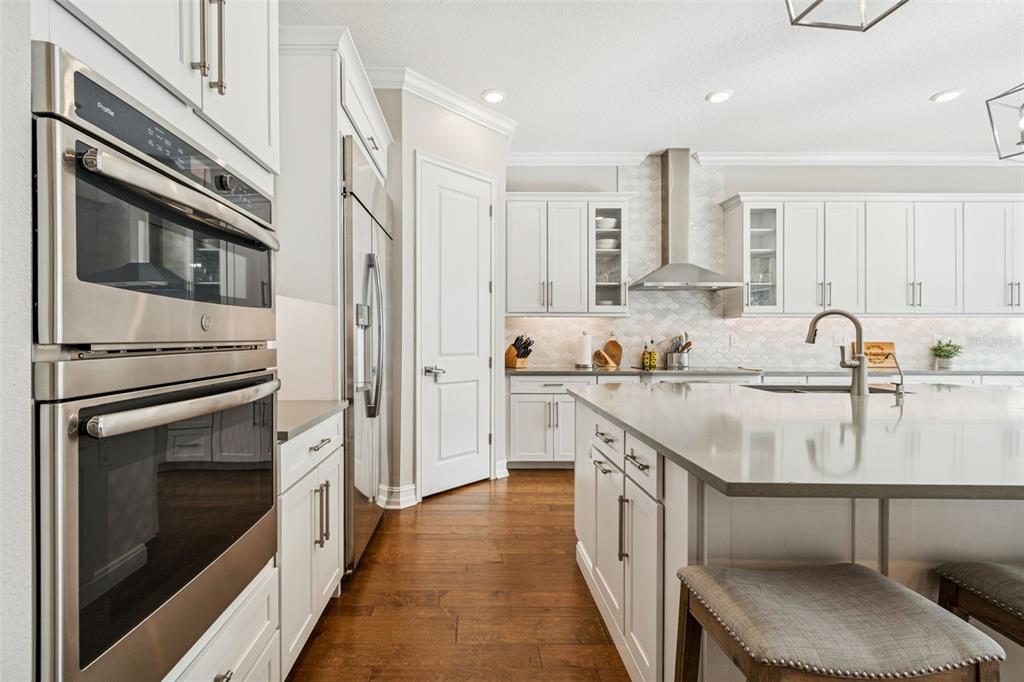 2519 Cordoba Ranch Boulevard Lutz, FL 33559 - Photo 18 of 77 a kitchen with granite countertop a sink stove and cabinets