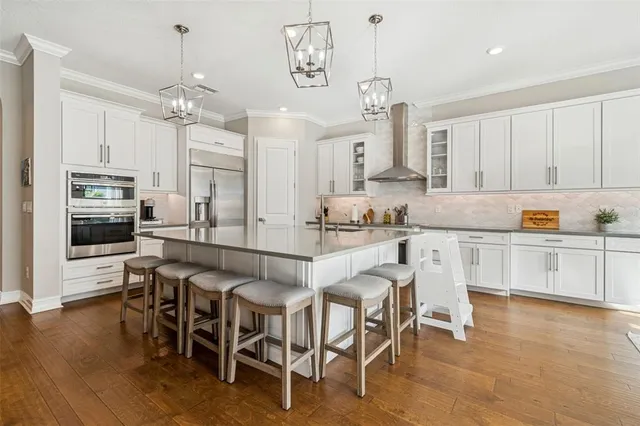 a view of a house with backyard porch and sitting area