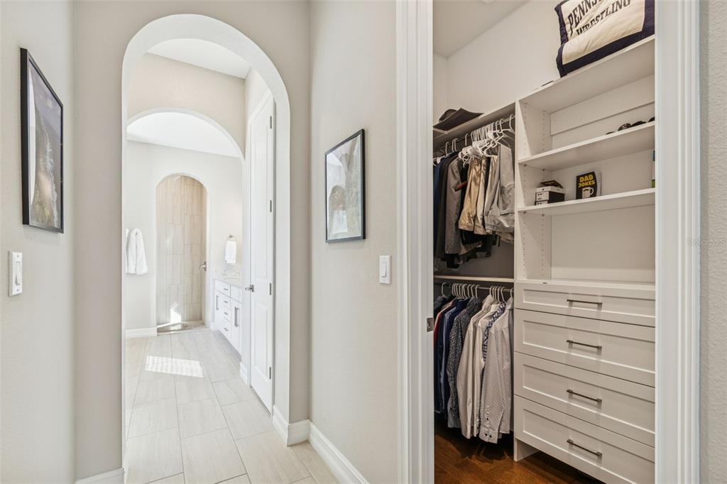 2519 Cordoba Ranch Boulevard Lutz, FL 33559 - Photo 36 of 77 a view of walk in closet with clothes and shoes