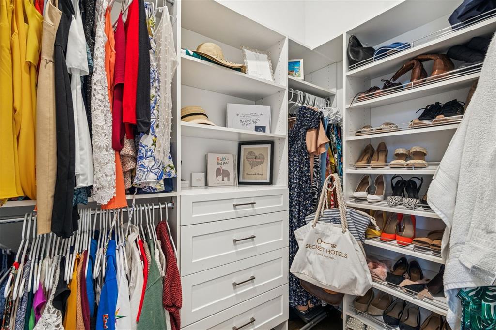2519 Cordoba Ranch Boulevard Lutz, FL 33559 - Photo 37 of 77 a view of walk in closet with clothes and shoes