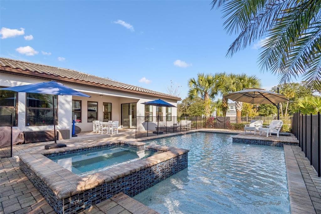 2519 Cordoba Ranch Boulevard Lutz, FL 33559 - Photo 45 of 77 a view of a house with swimming pool and sitting area
