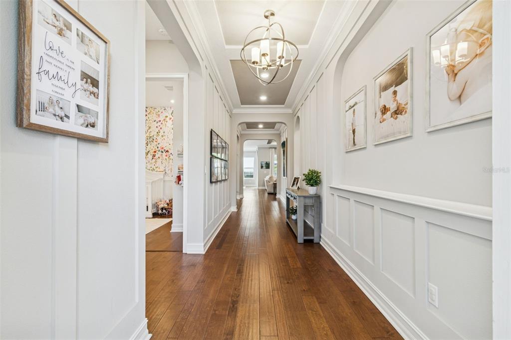 2519 Cordoba Ranch Boulevard Lutz, FL 33559 - Photo 6 of 77 a view of a hallway with wooden floor