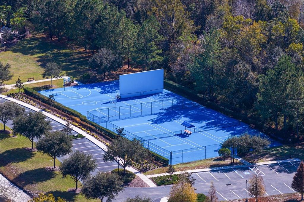 2519 Cordoba Ranch Boulevard Lutz, FL 33559 - Photo 76 of 77 a view of a backyard with sitting area