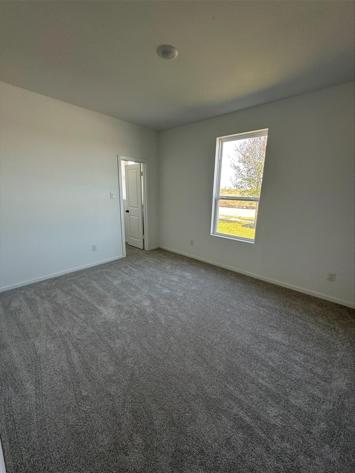 8207 Holly Blue Drive Rosharon, TX 77583 - Photo 13 of 28 an empty room with a window
