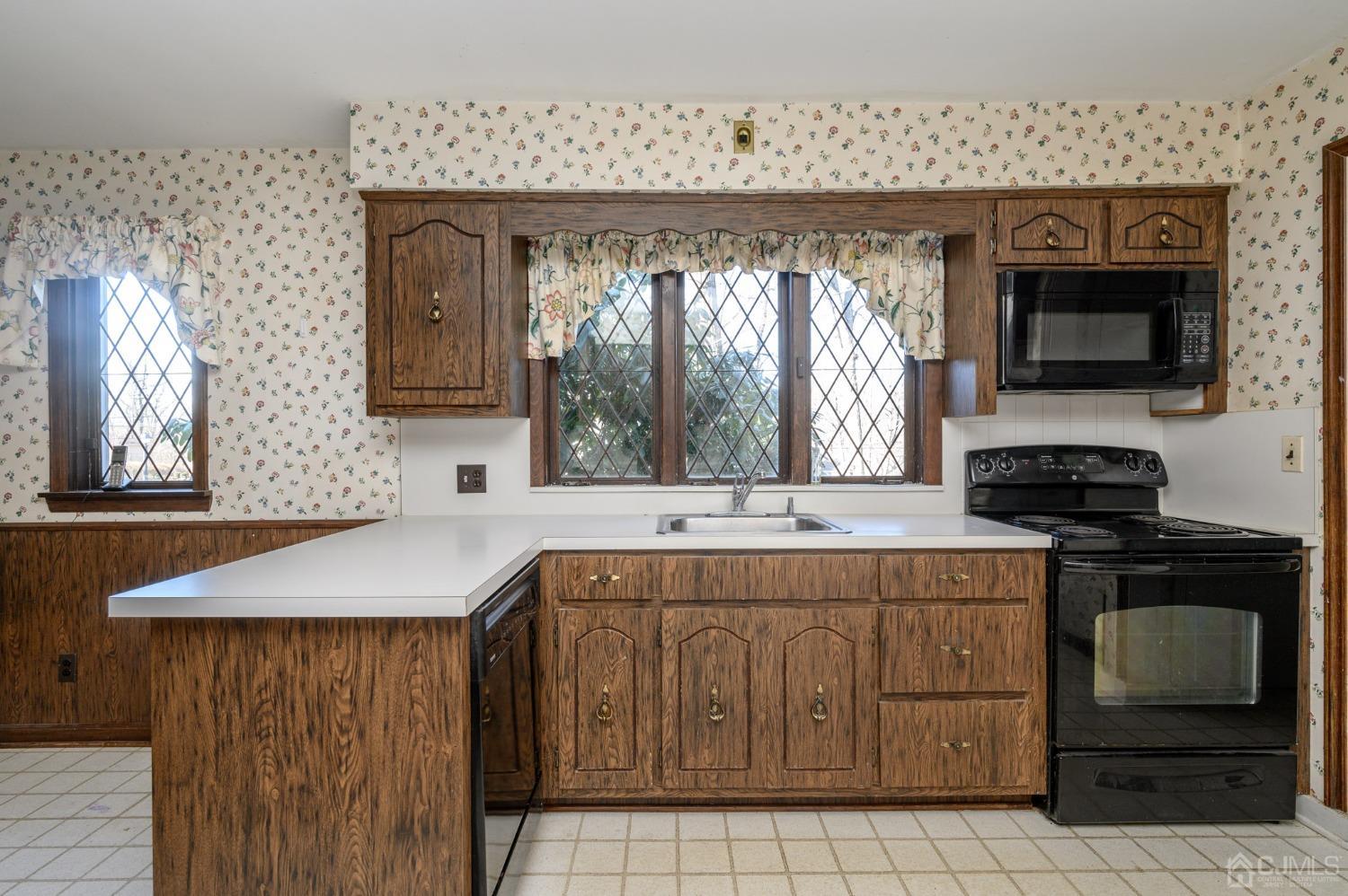 6 Far View Drive Mountainside, NJ 07092 - Photo 12 of 45 a kitchen with a stove and a sink