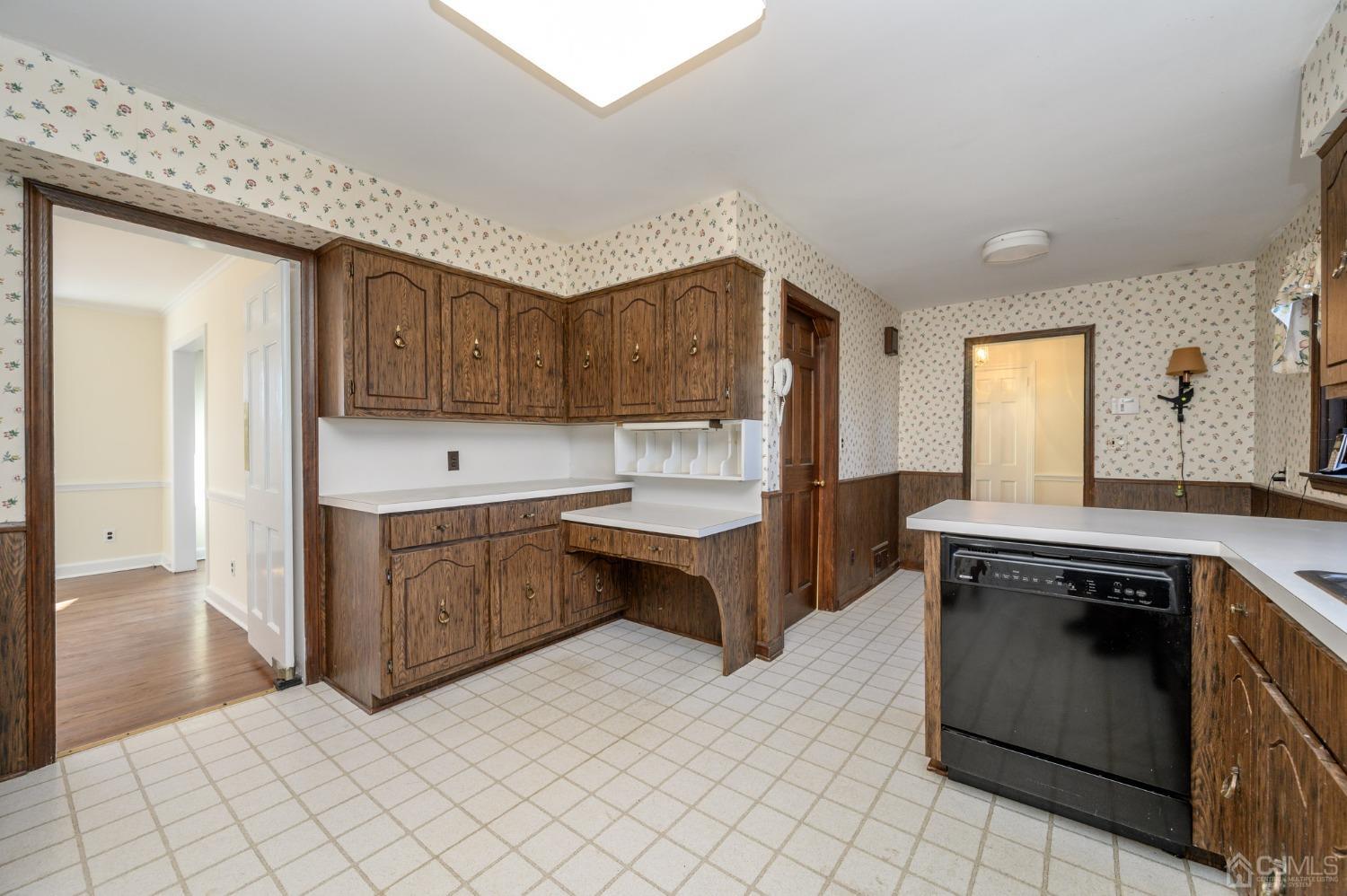 6 Far View Drive Mountainside, NJ 07092 - Photo 14 of 45 a kitchen with a stove a sink and a refrigerator