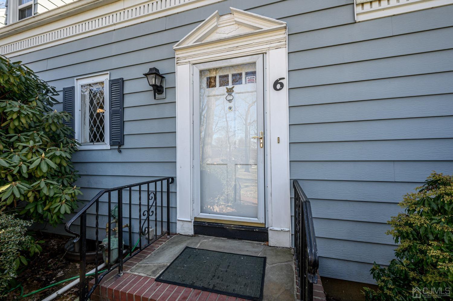 6 Far View Drive Mountainside, NJ 07092 - Photo 2 of 45 a view of front door and a potted plant