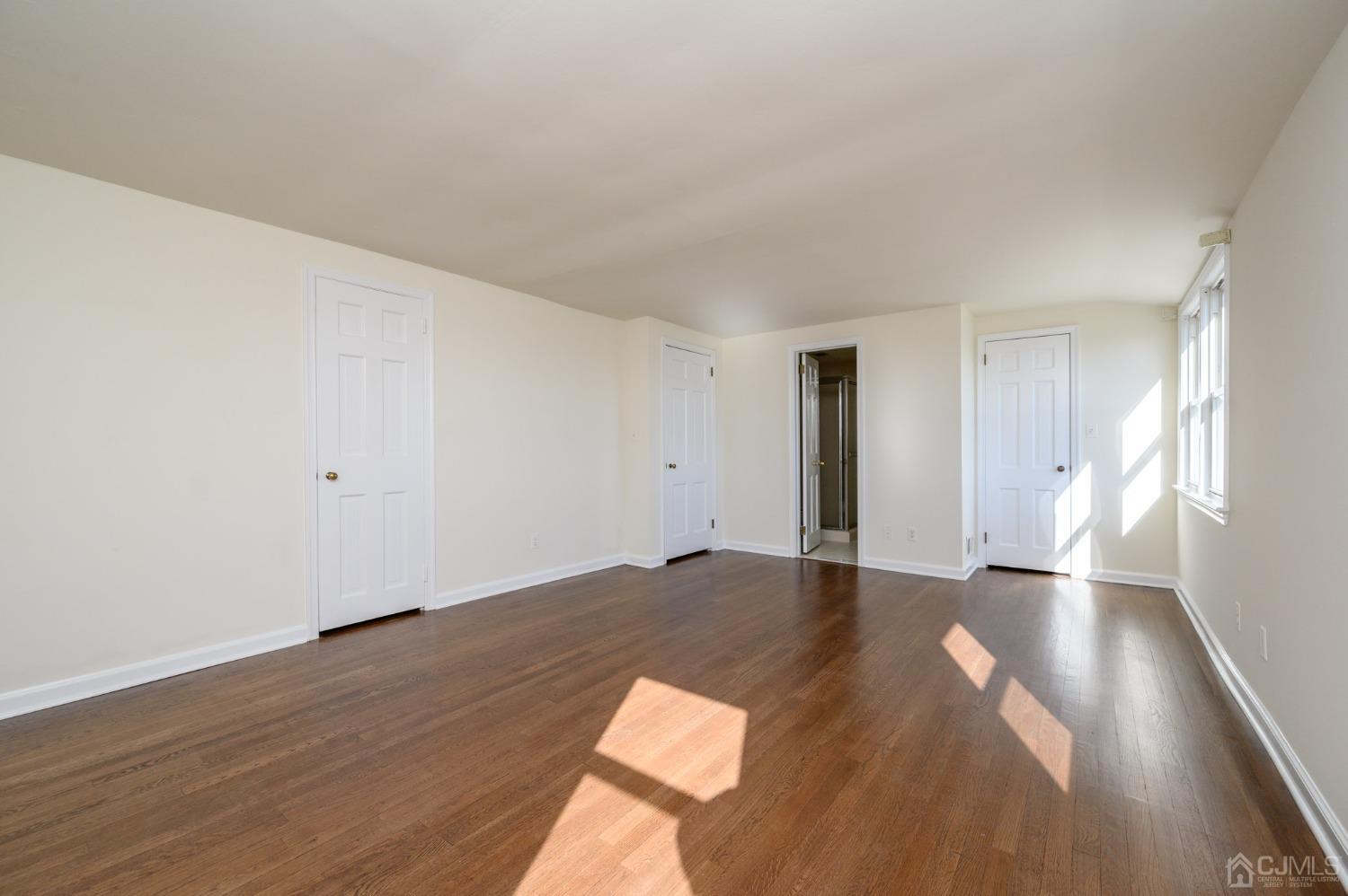 6 Far View Drive Mountainside, NJ 07092 - Photo 24 of 45 a view of an empty room with wooden floor