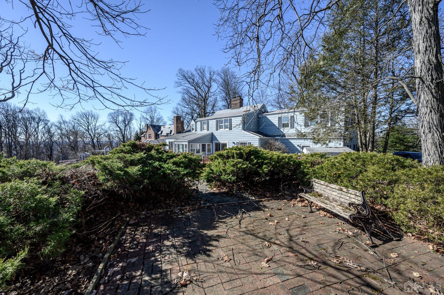 6 Far View Drive Mountainside, NJ 07092 - Photo 36 of 45 a backyard of a house with lots of green space