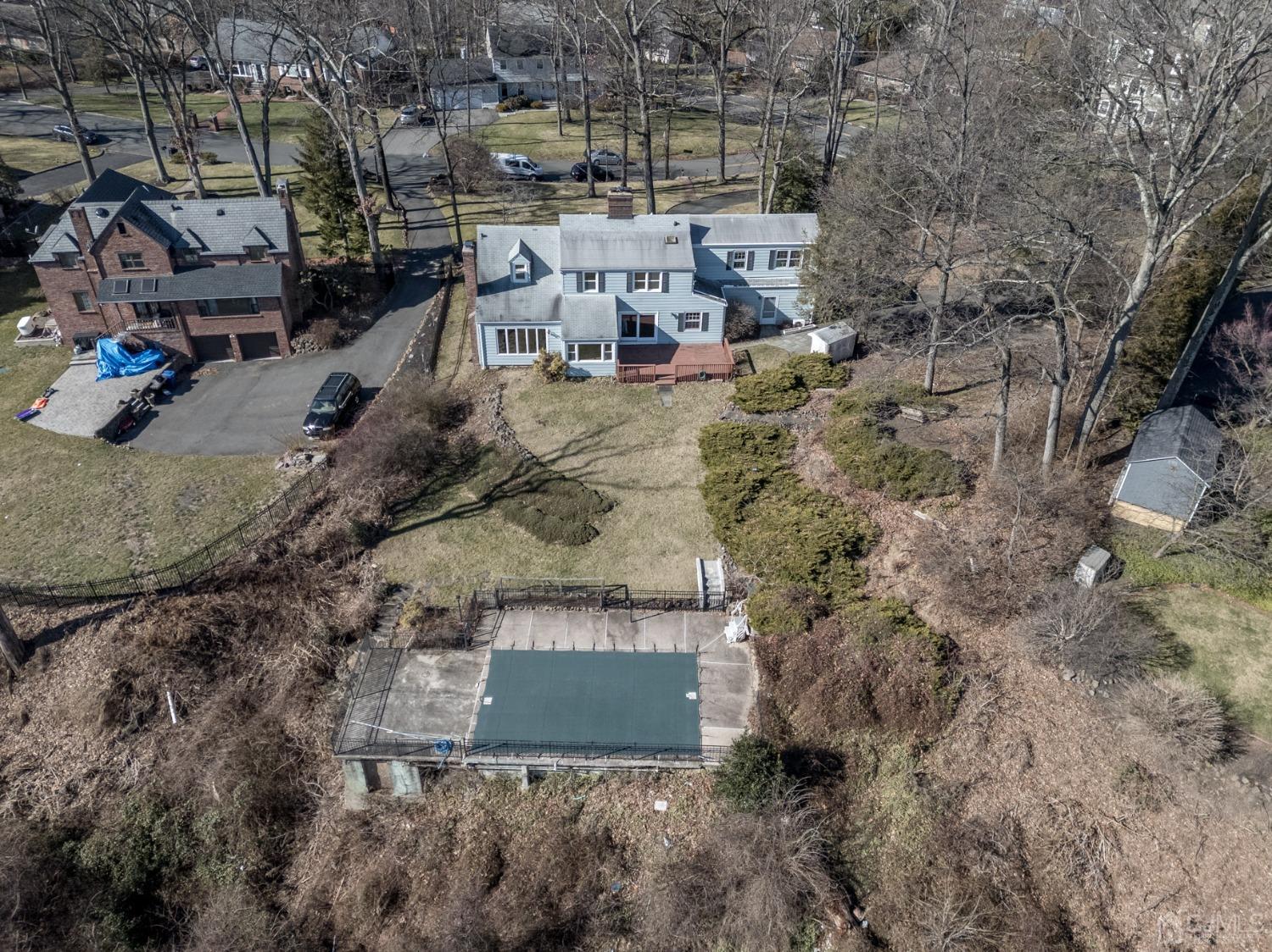6 Far View Drive Mountainside, NJ 07092 - Photo 43 of 45 a view of a house with a yard and sitting area