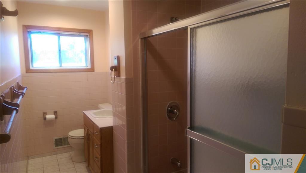 4 Yale Road Old Bridge, NJ 08859 - Photo 13 of 17 a bathroom with a shower and a toilet