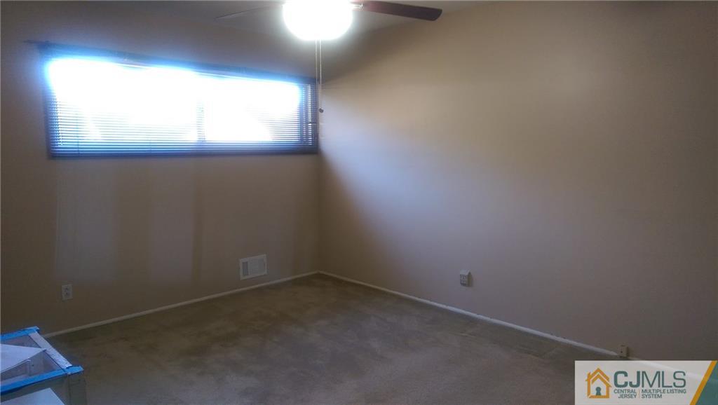 4 Yale Road Old Bridge, NJ 08859 - Photo 9 of 17 an empty room with a window